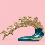 Golden 7 Running Horses Statue on Wave